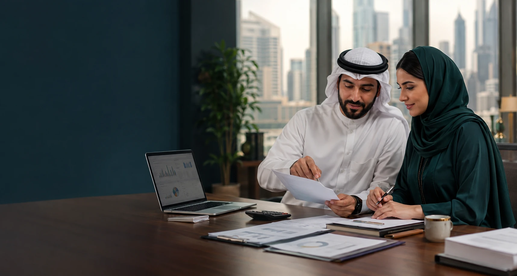 Accounting professionals collaborating on business records